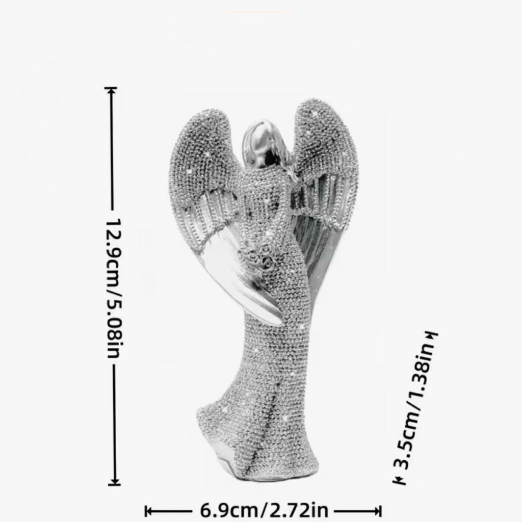 Christmas Angel Figurine - A silver rhinestone-embellished angel figurine shown with dimension lines and measurements: 12.9 cm tall, 6.9 cm wide.