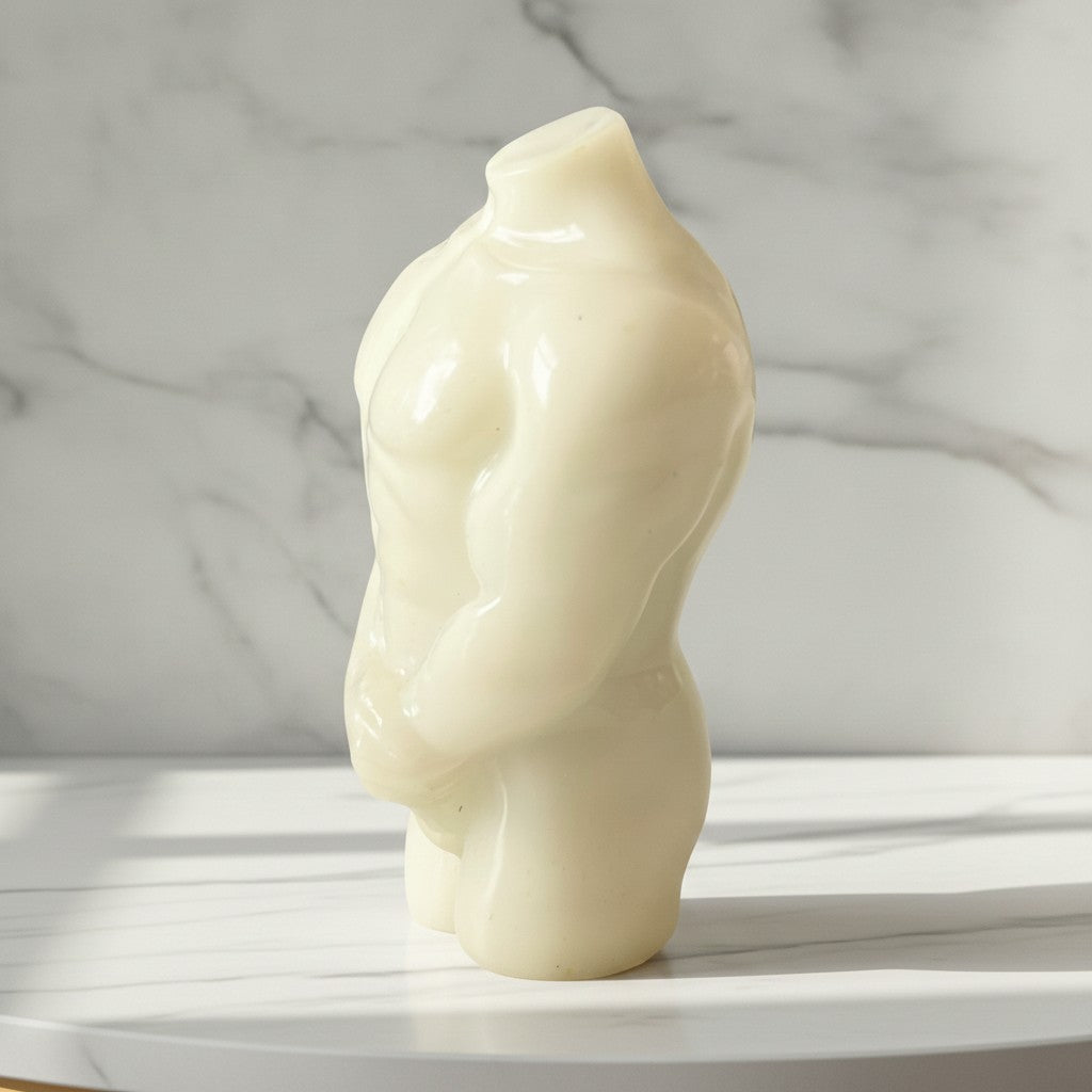 Male Torso Figurine showcasing a smooth resin finish, ideal for modern decor and artistic accents.